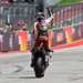 Alex Rins crosses the line to win at COTA