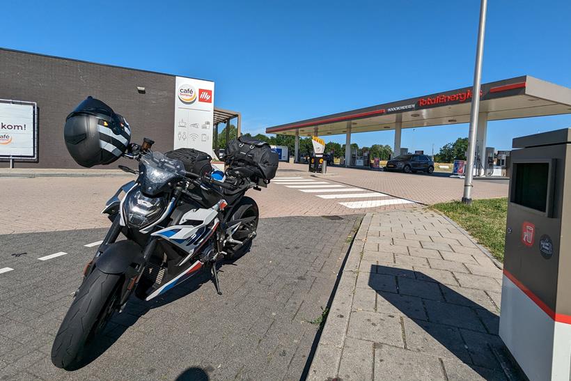 MCN Fleet BMW M1000R at a fuel station