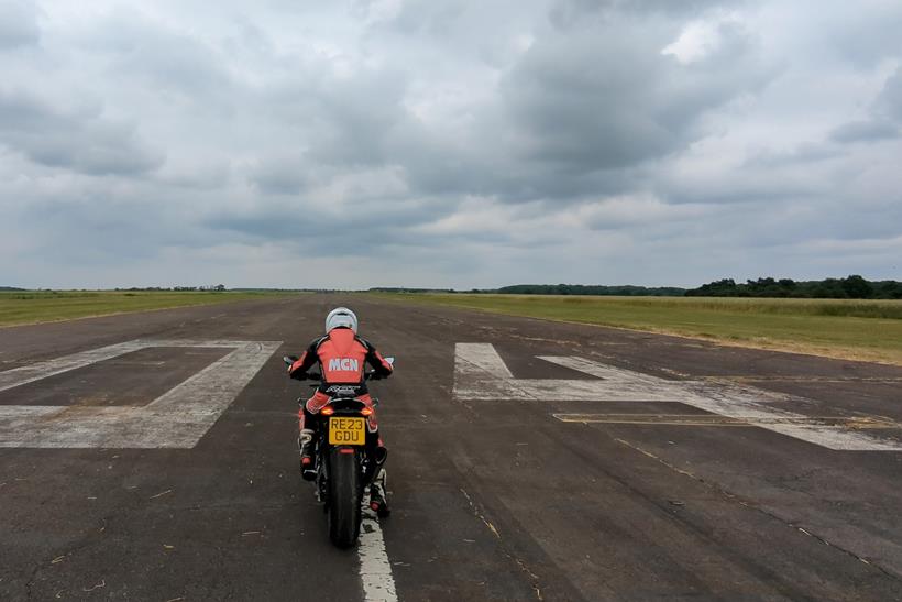 BMW M1000R performance testing on runway