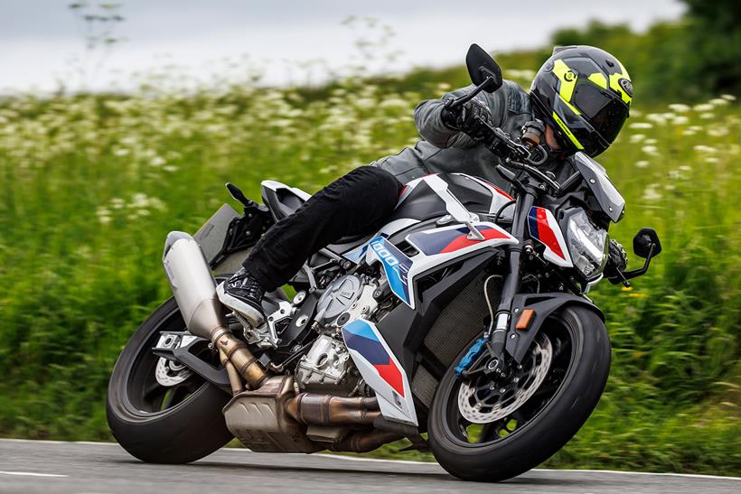 MCN fleet BMW M1000R turning left on the road