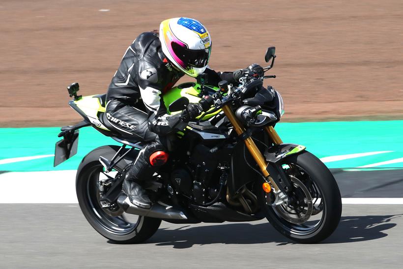 Emma Franklin rides a Triumph Street Triple 765 Moto2 on track at Silverstone