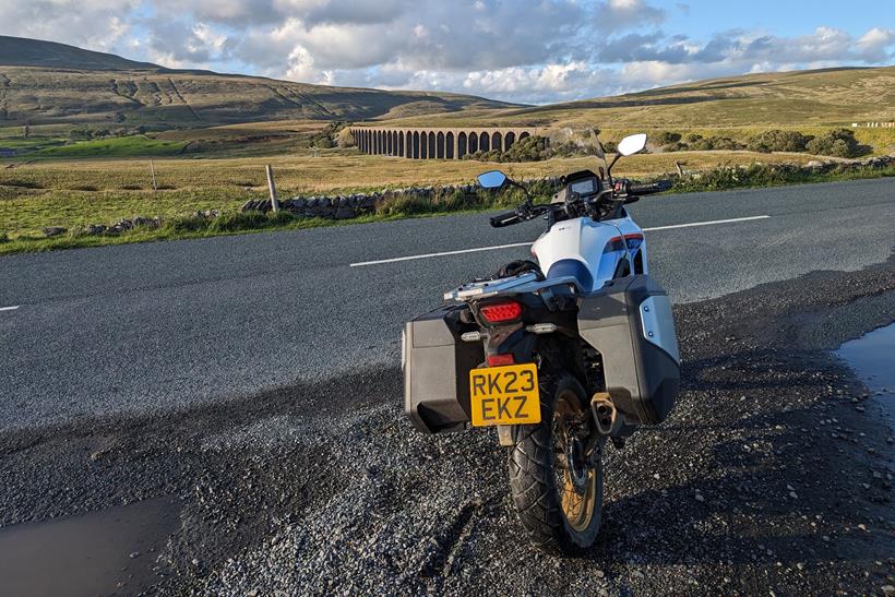 Honda XL750 long-term test bike parked in lay-by with scenic view