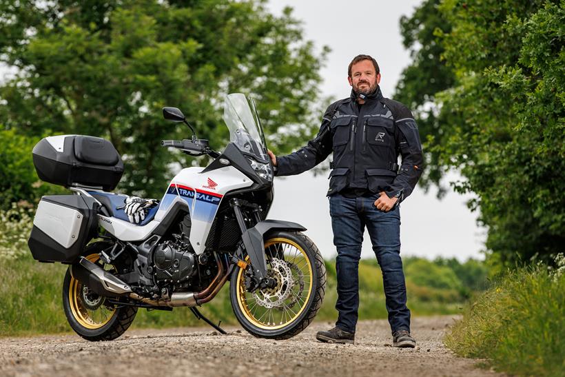 Gareth Evans stands by the Honda Transalp long-term test bike