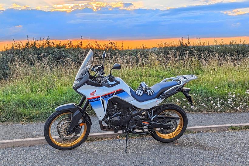 Honda XL750 Transalp parked in a lay-by at dusk