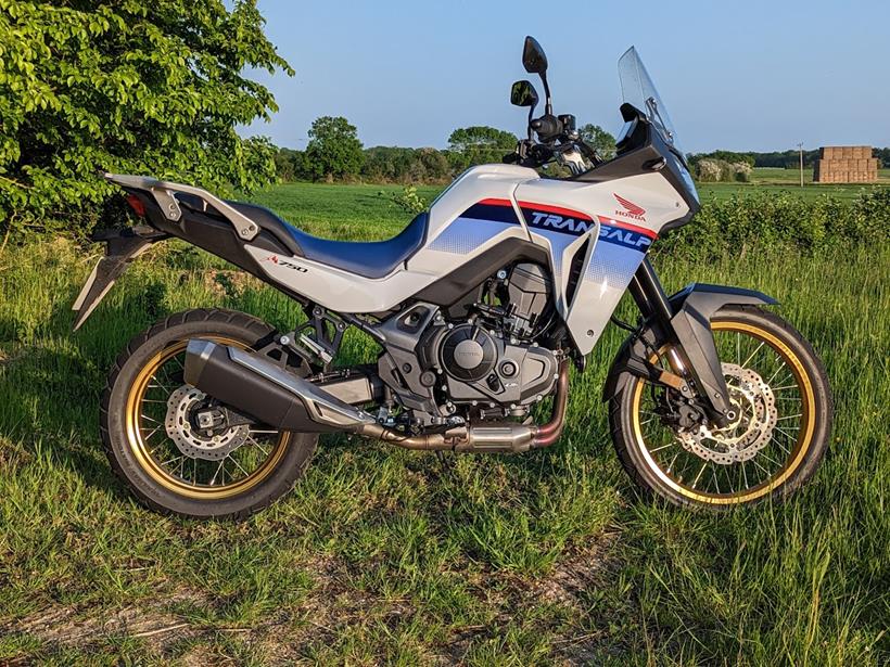 Honda Transalp right side parked in a field