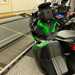 Kawasaki Ninja H2 SX SE long-term test bike hooked to a railing in the Channel Tunnel