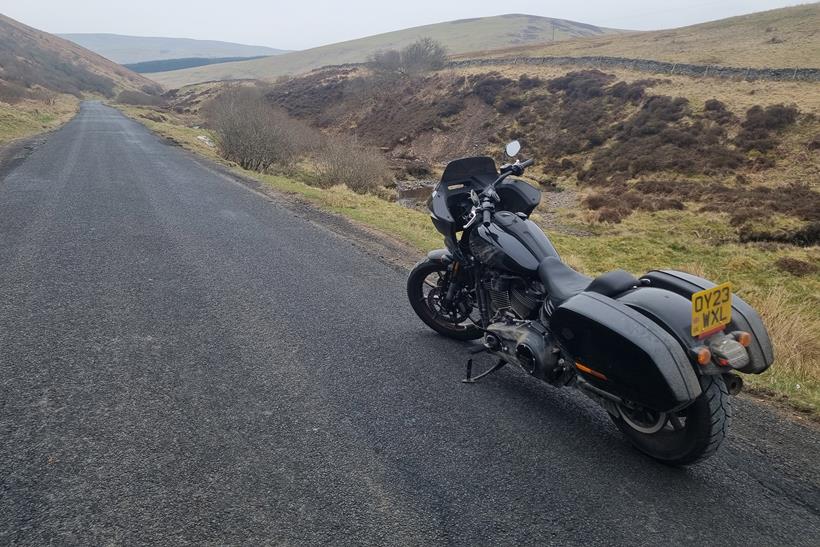 Long-term Harley-Davidson Low Rider ST by the road side