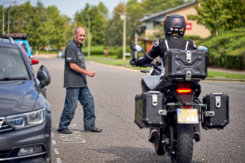 Pedestrian steps out in front of Zero DSR/X long-term test bike