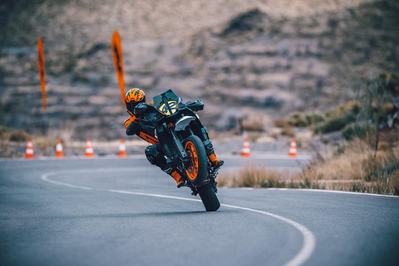 Pulling a wheelie through a corner on the 2023 KTM 890 SMT