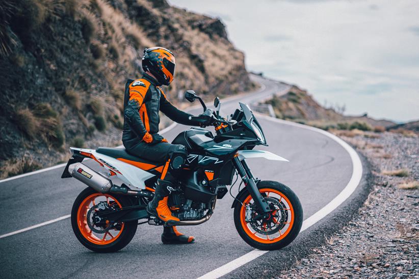 Parked on a road with the 2023 KTM 890 SMT