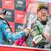 Dean Harrison and Peter Hickman celebrate on the TT podium