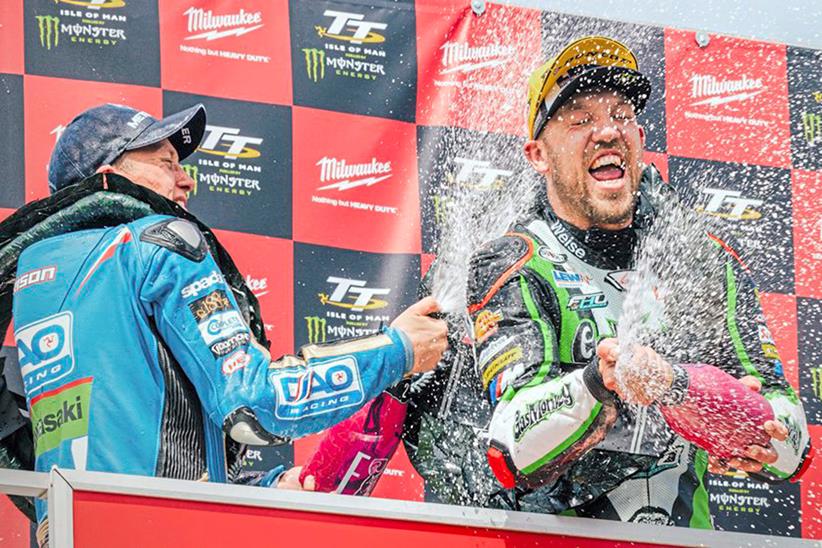 Dean Harrison and Peter Hickman celebrate on the TT podium