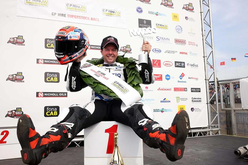 Alastair Seeley celebrates victory in todays Superstock race. Photo Stephen Davison/Pacemaker Press