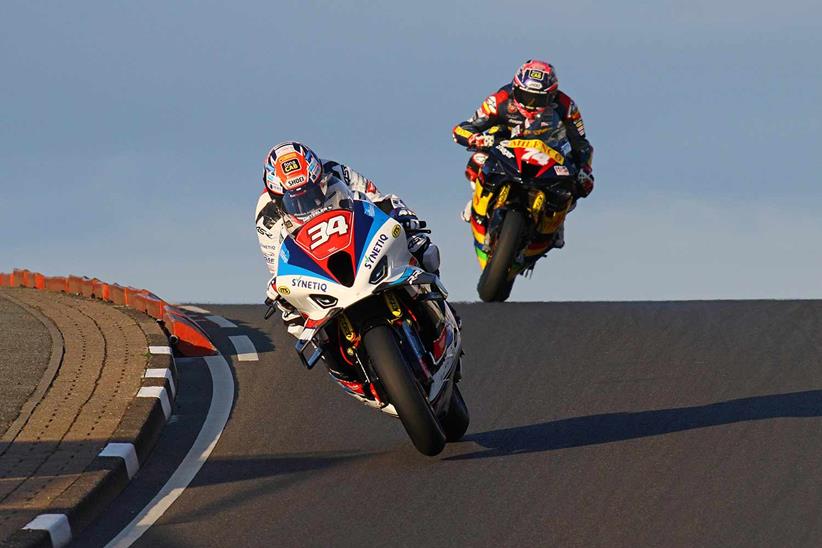 Alastair Seeley leads Davey Todd in the North West 200 Superstock race