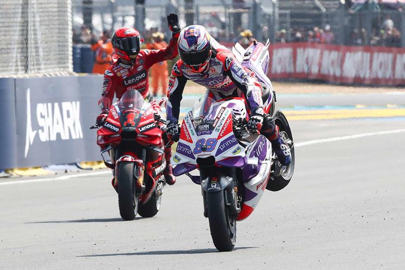 Jorge Martin celebrates victory with a stoppie at Le Mans