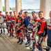 A line-up of top motorcycle racers past and present on the balcony at Goodwood