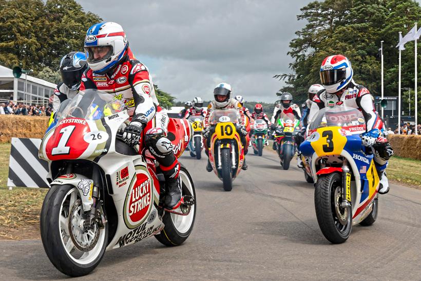 Schwanz and Spencer lead a procession of classic race machinery. Credit: Oli Tennent