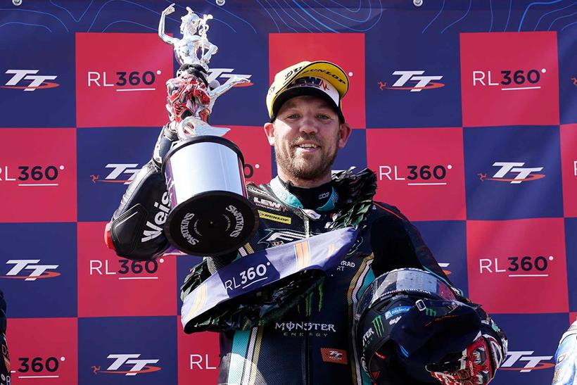 Peter Hickman celebrates his Superstock TT race win (Credit: Pacemaker Press)