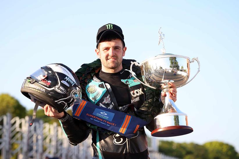 Michael Dunlop celebrates his Supertwin TT victory (Credit: Stephen Davison / Pacemaker Press)