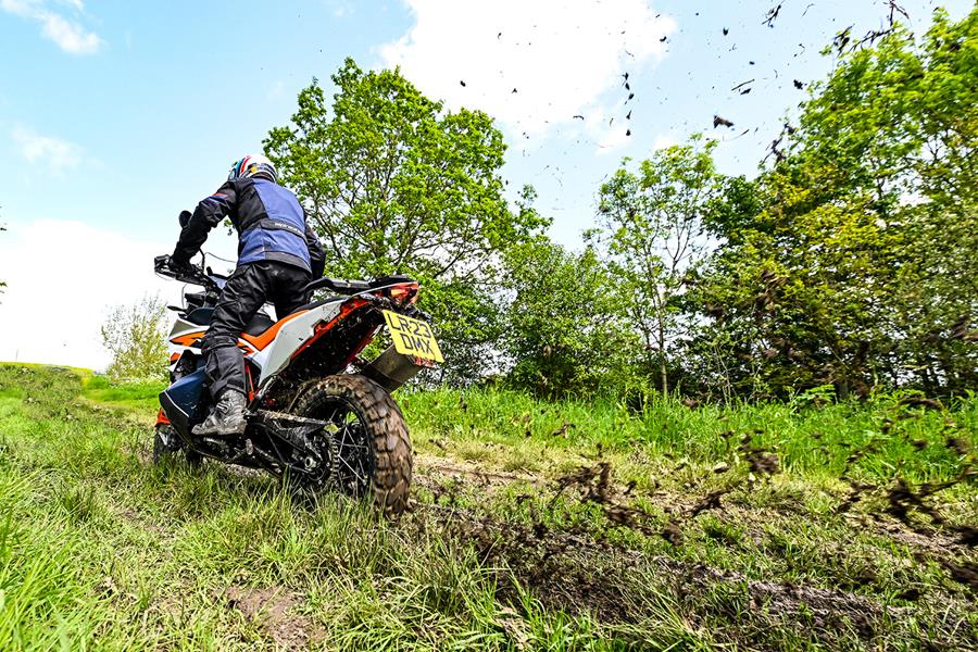 KTM 890 Adventure R spinning up in the dirt