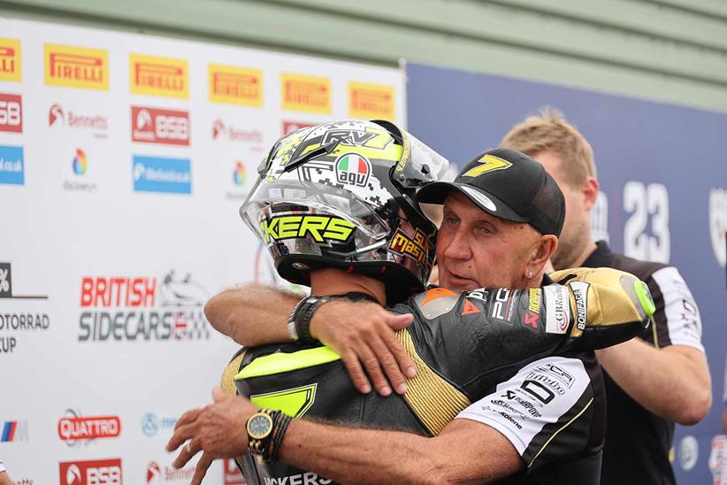 Ryan Vickers hugs Roger Marshall after qualifying second at Knockhill