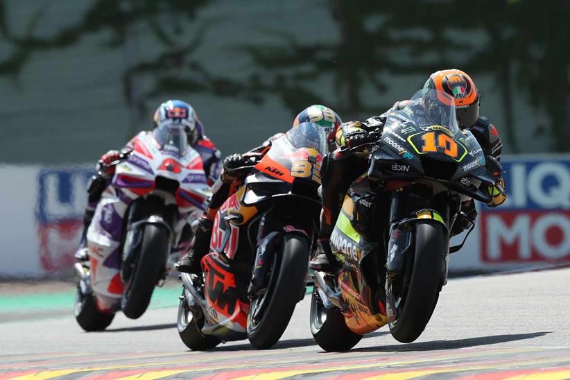 Luca Marini battles Brad Binder and Johann Zarco at the Sachsenring