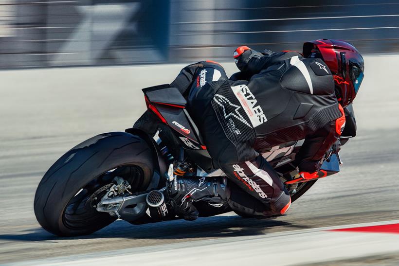 Cornering on an Aprilia RSV4 Factory wearing an Alpinestars Supertech R10