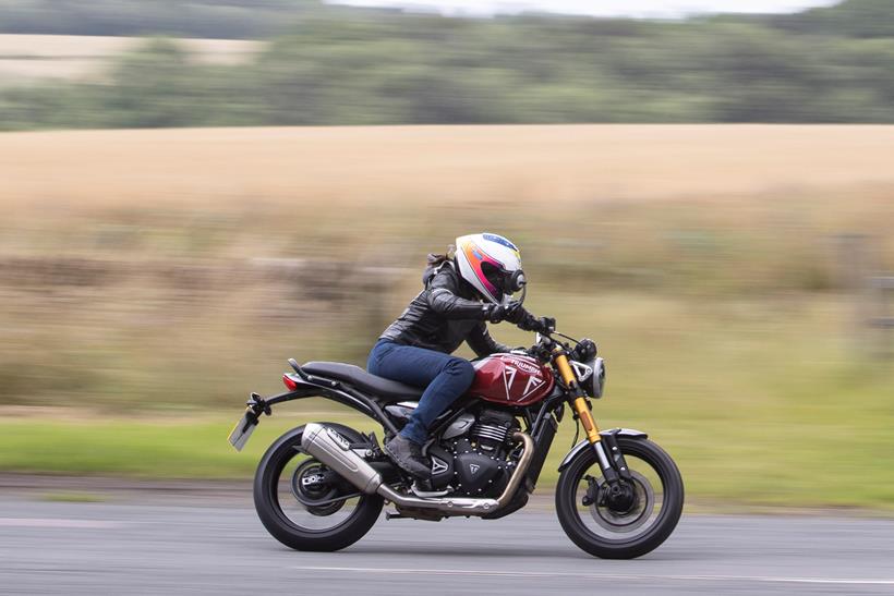 Triumph Speed 400 with red tank on the road