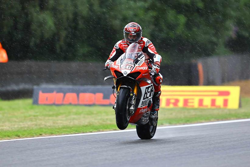 Tommy Bridewell pulls a wheelie in the rain at Brands Hatch