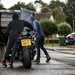 A stolen motorbike is loaded into a van