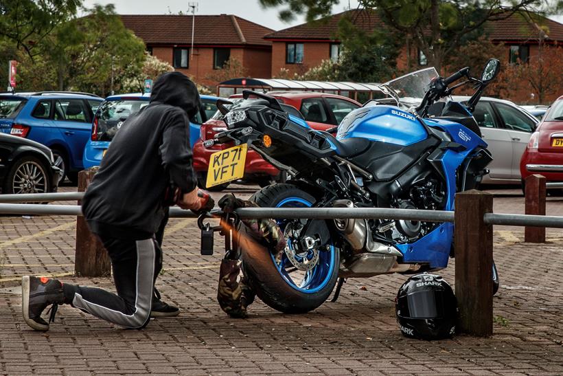 Motorbike security attacked with an angle grinder