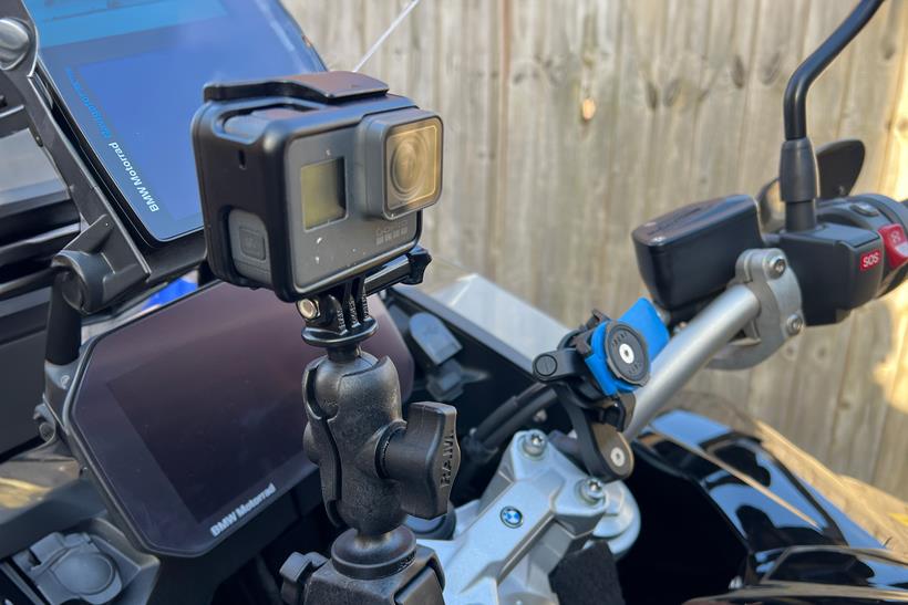 CU of action camera mounted on handlebar facing backwards