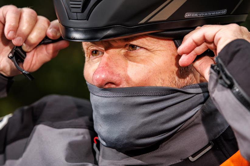 Rider wearing neck warmer