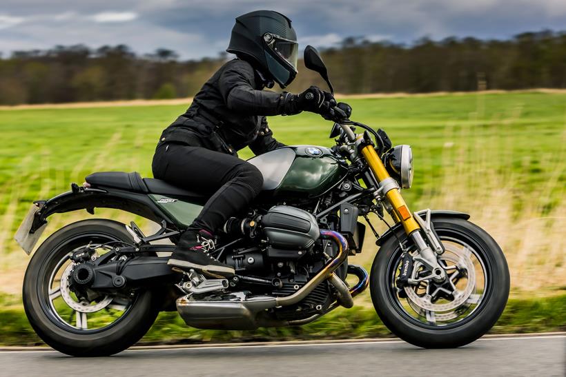 Alpinestars Banshee leggings worn by female rider on a BMW motorcycle