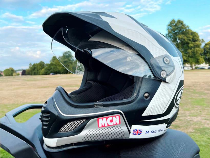 Arai Tour-X 4 on motorcycle seat