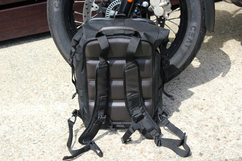 Givi Corium next to motorbike wheel