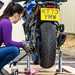 Chain cleaning set up, motorcycle mounted on a paddock stand