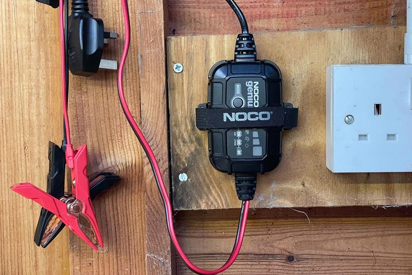 Noco Genius 2 Battery Charger mounted to wall