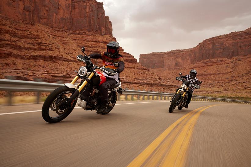 A Triumph Scrambler 1200 XE being ridden on the road