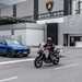 Ducati Multistrada passes Lamborghini Urus at junction