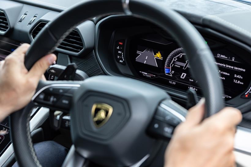 Lamborghini dash displaying warning