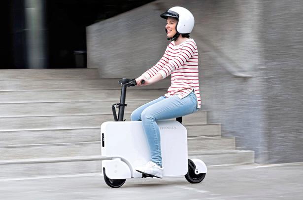 Honda electric scooter folds suitcase-small, priced under $1,000