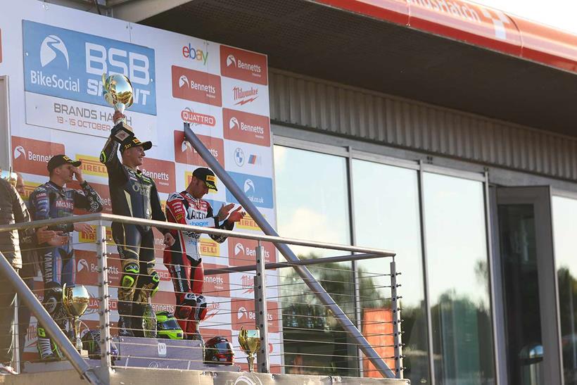 Kyle Ryde celebrates victory on the Brands Hatch podium