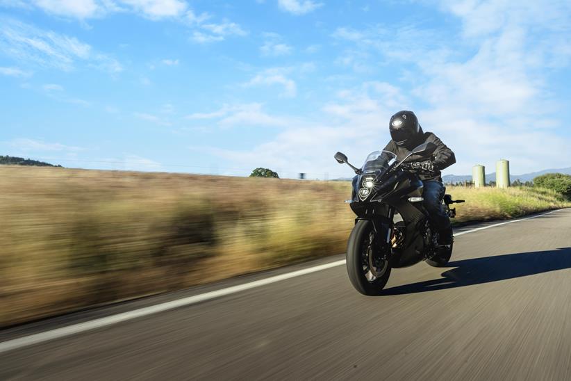 2024 Suzuki GSX-8R front three quarters in black, on a road