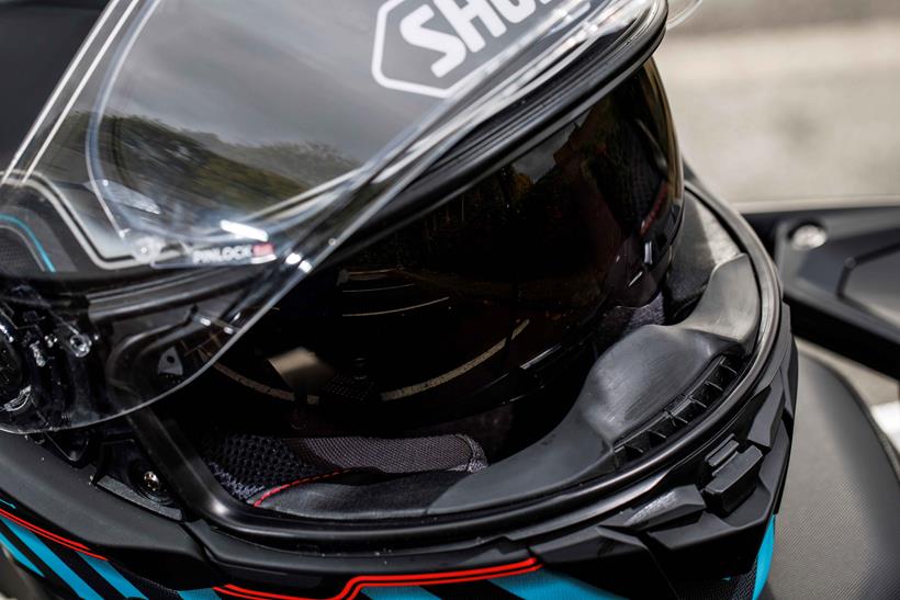 Shoei GT-Air 3 visor aperture showing lock, sun shade and breath guard