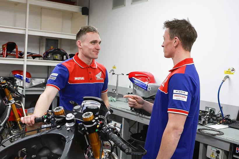 Nathan and Dean Harrison chatting at Honda HQ