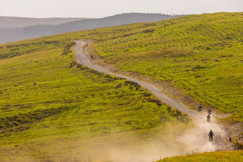 Motorcycles riding an off-road track at Sweet Lamb in Wales