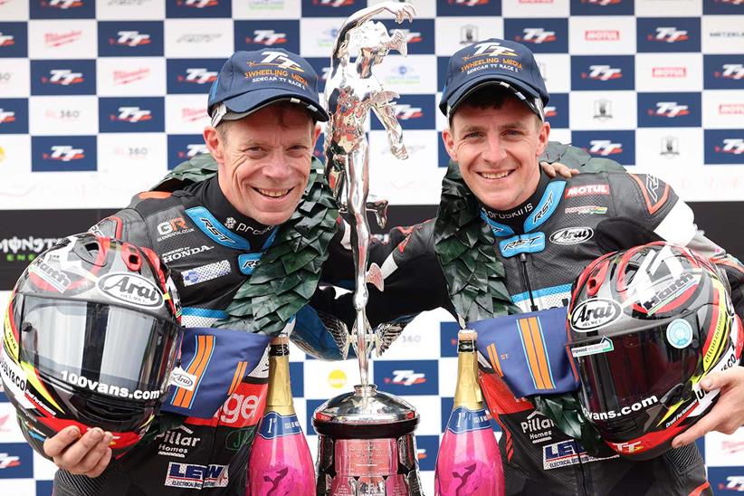 BEN AND TOM BIRCHALL CELEBRATE WINNING SIDECAR RACE 2 AT THE 2023 ISLE OF MAN TT