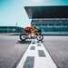KTM RC 8C crossing the start/finish line on track