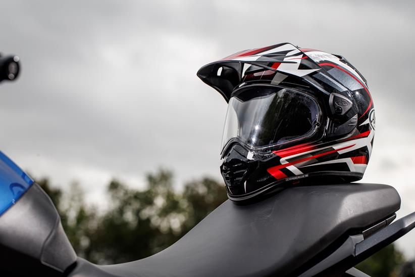 Arai Tour-X 5 helmet on bike seat